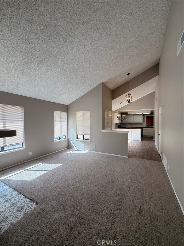16241 Tokay, Victorville, CA 92395 Front Door leads to Living room or dinning room connected to kitchen.