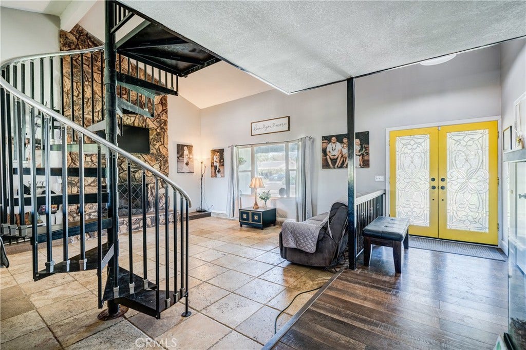 6616 Landfair, Riverside, CA 92509 Spiral staircase leading to loft/bedroom/extras pace/art studio