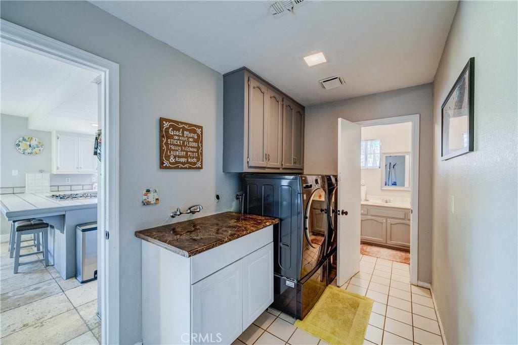 6616 Landfair, Riverside, CA 92509 Laundry room and guest bathroom