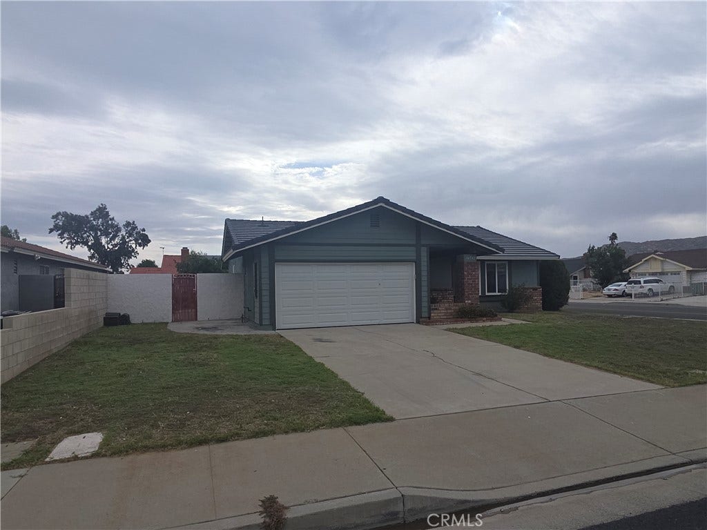 14742 Aruba, Moreno Valley, CA 92553 Front and side of House