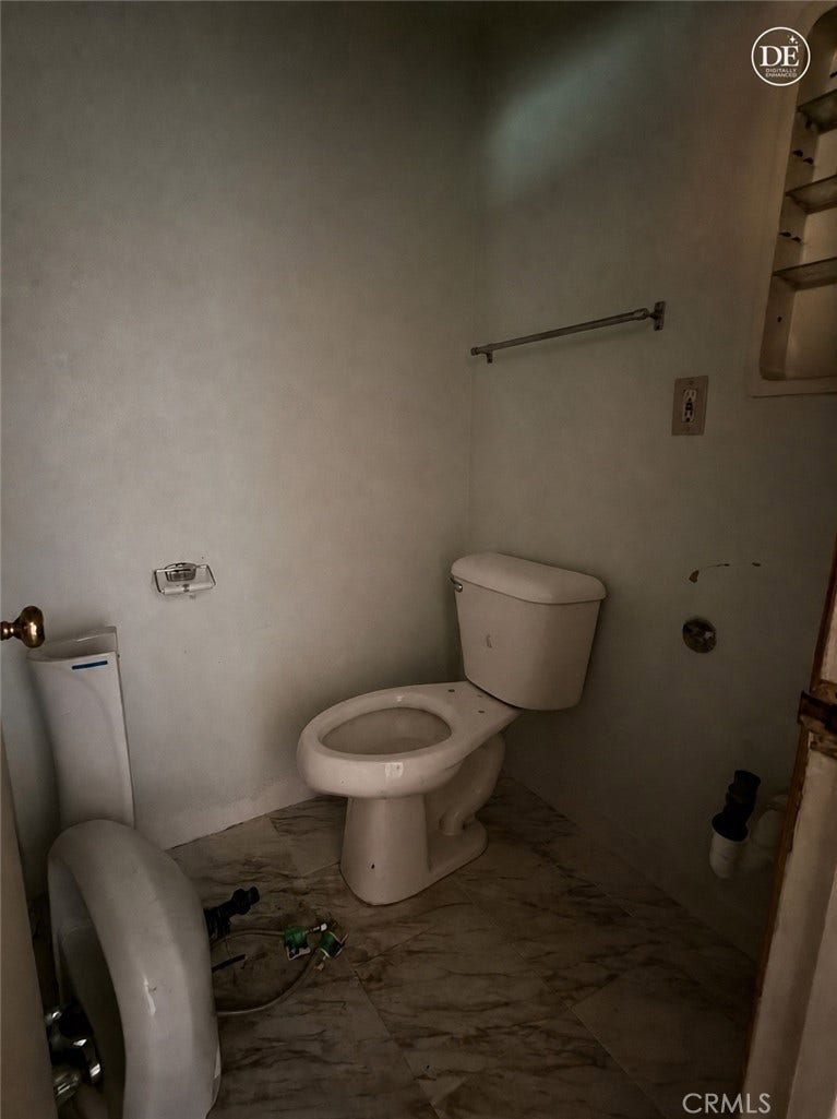 Enhanced photo to clean up bathroom