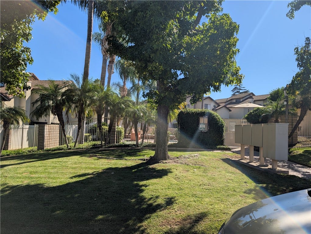 5050 Canyon Crest Drive, Riverside, CA 92507 Across from condo is the pool area and dog park.