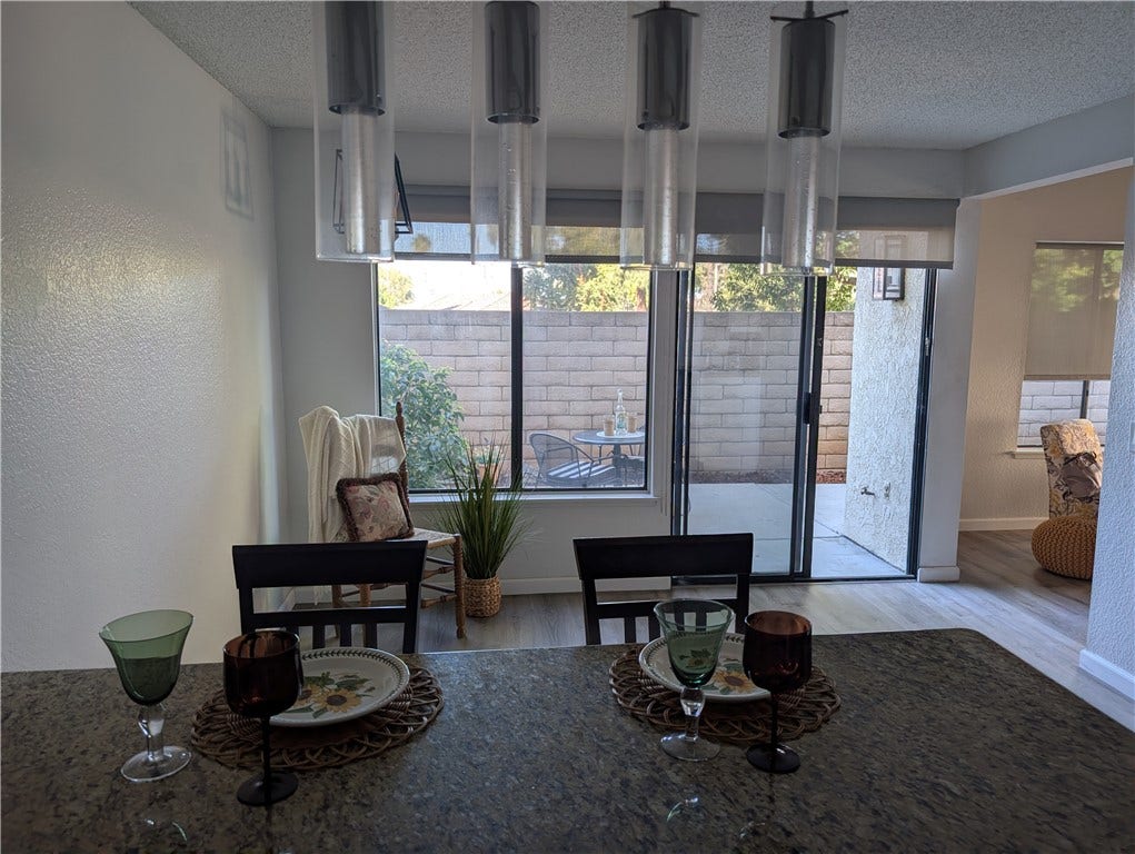5050 Canyon Crest Drive, Riverside, CA 92507 Breakfast bar with dining area in kitchen,