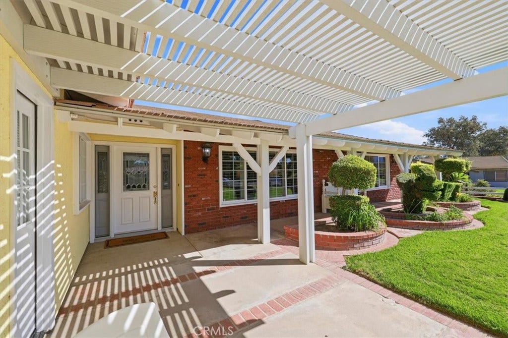 2791 Bronco Lane, Norco, CA 92860 Inviting front entry with a welcoming covered porch and well-maintained landscaping