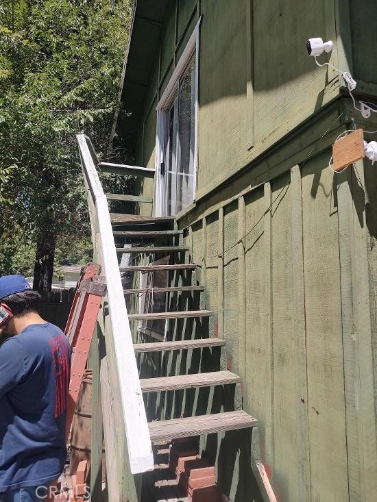 stairs to bonus room or potential rental room