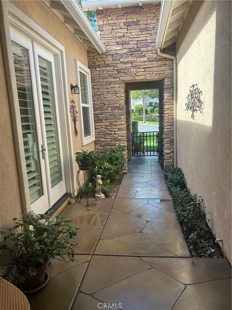 Cored and stained cement. French doors lead to the office