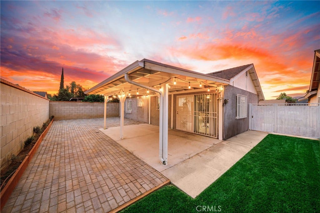 Private rear yard with cover