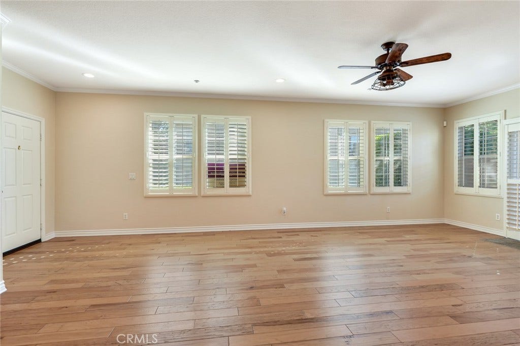 7353 Ellena W, #198, Rancho Cucamonga, CA 91730 Downstairs great room w/Plantation Shutters and wood floors