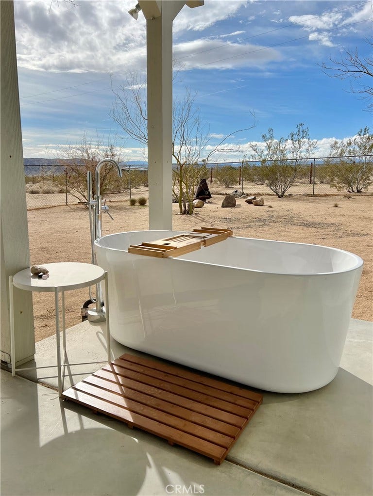 Tub under porch