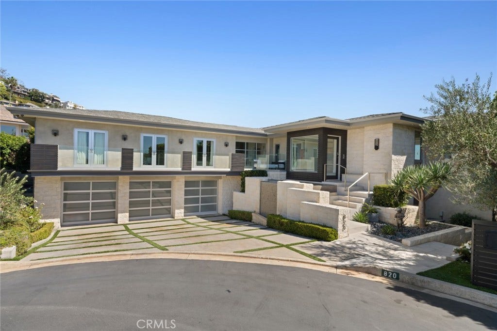 Encompassing approximately 5,875 square feet on an expansive 10,260 square foot homesite, the residence showcases refined design, generous proportions and meticulous attention to detail.