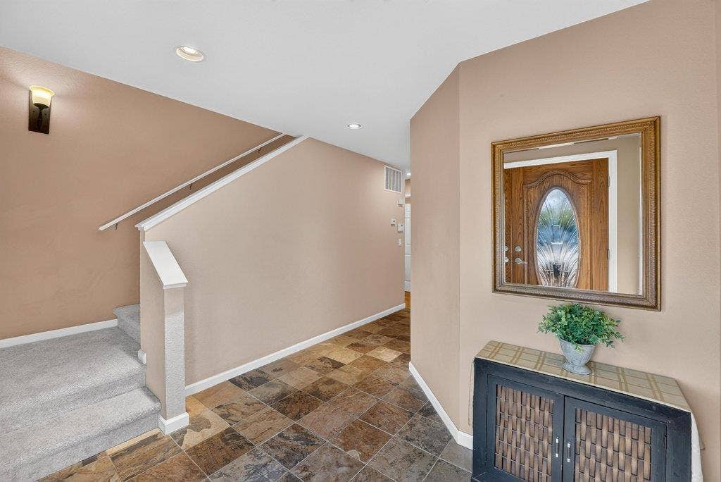 110 Mattison Court, Aptos, CA 95003 Entry area with stone floor and stairs.