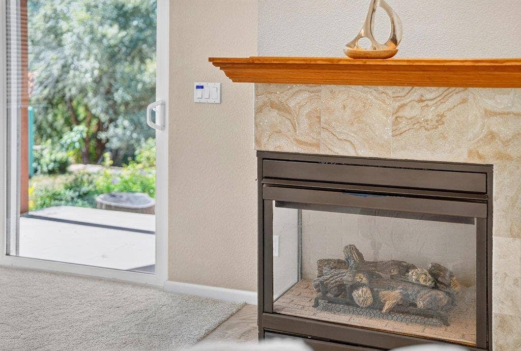 110 Mattison Court, Aptos, CA 95003 Primary bedroom fireplace.