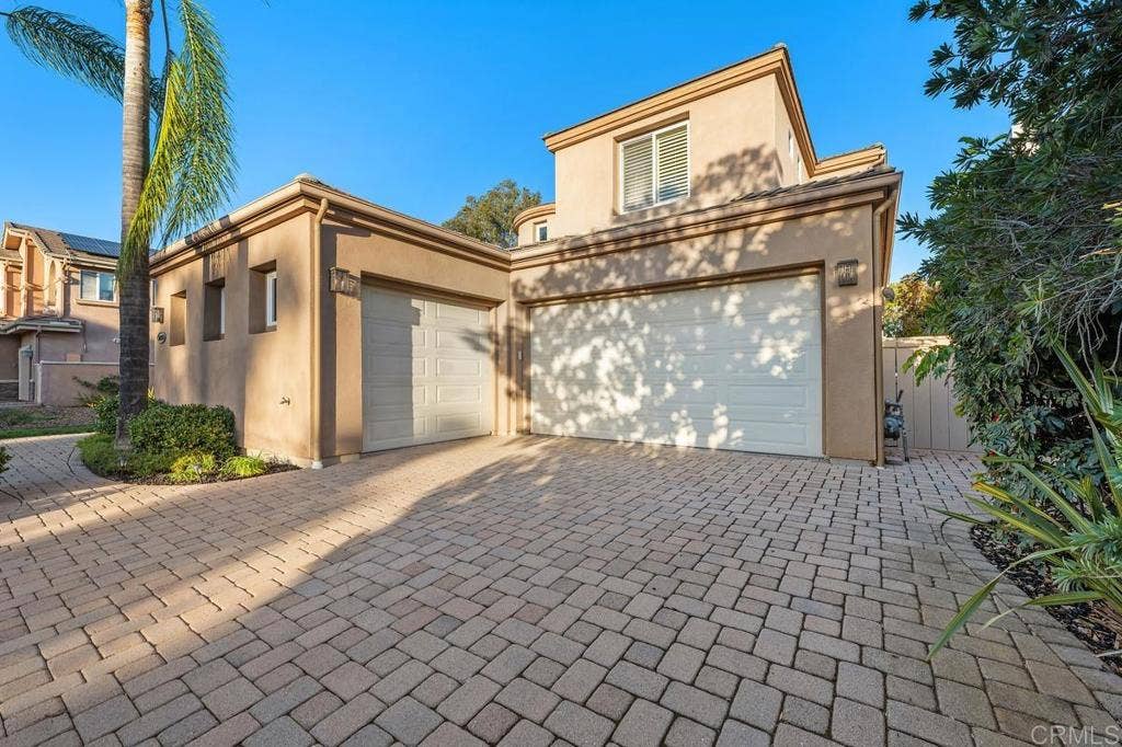 12755 Fairbrook Rd, San Diego, CA 92131 Oversized garage with built in cabinets, car charger