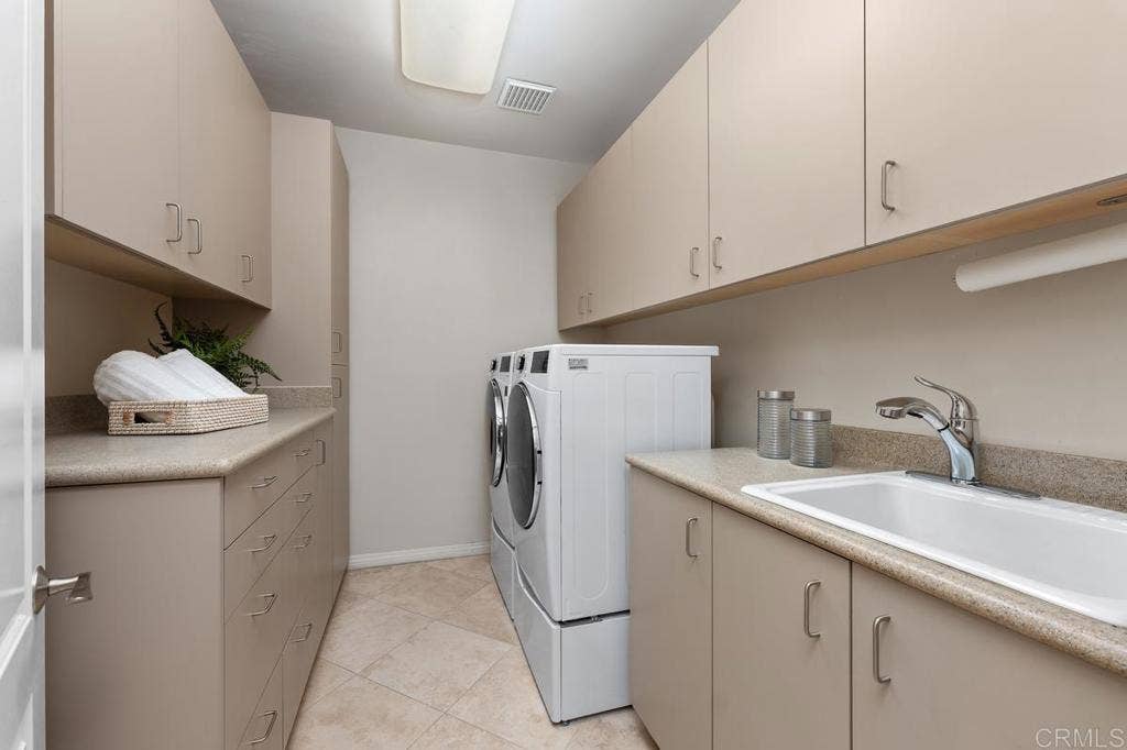 12755 Fairbrook Rd, San Diego, CA 92131 This Laundry room has a laundry shoot from second floor.