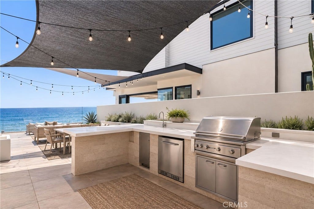 1880 N El Camino Real, #74, San Clemente, CA 92672 Rendered wall behind the BBQ