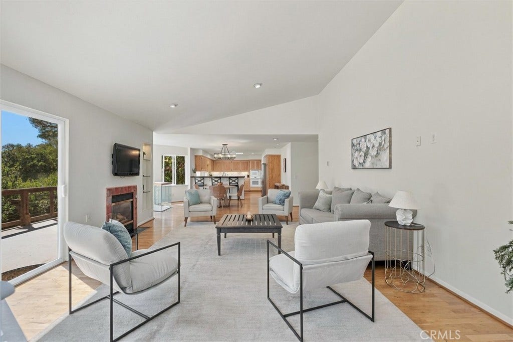 Main floor Open Living space with Fireplace.