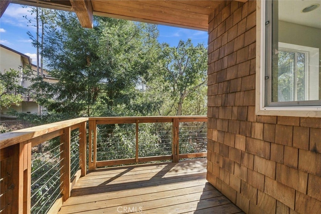 Lower level private deck from Primary Ensuite