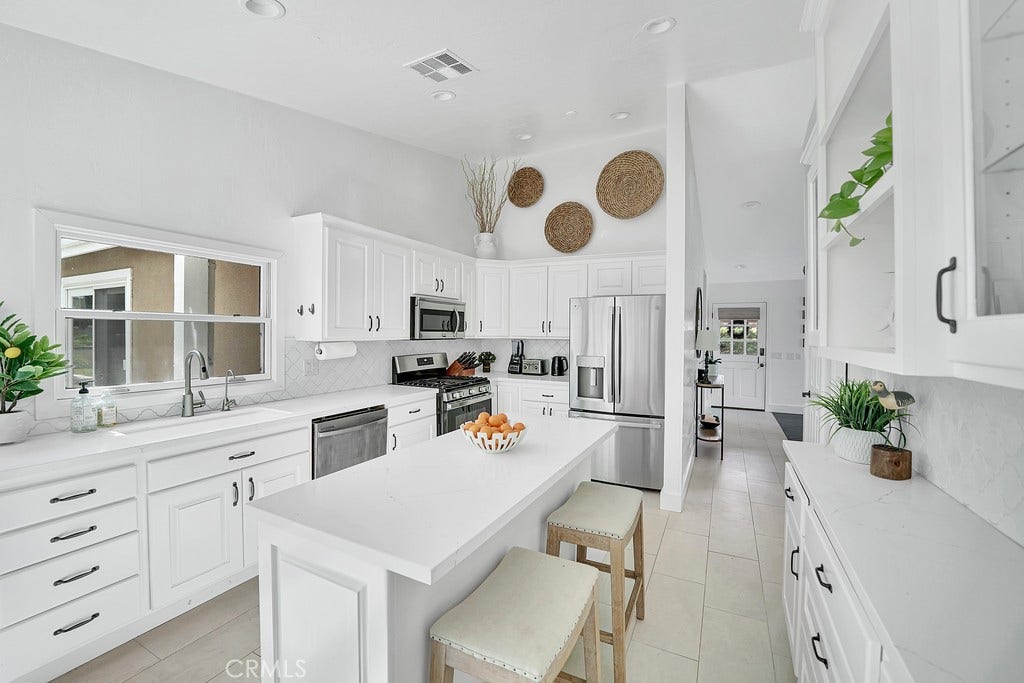 2897 Calle Heraldo, San Clemente, CA 92673 Island and plenty of cabinet space.Extra Refrigerator/Freezer and large panty in garage.