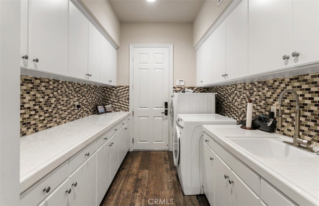31201 Old San Juan Road, San Juan Capistrano, CA 92675 Laundry with sink and ample storage