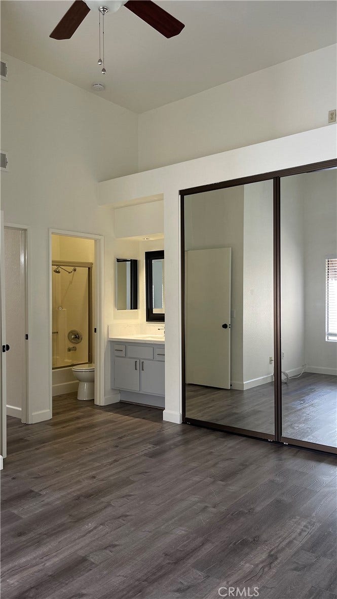 Primary Bedroom w/vaulted ceilings gives an open airy feel.