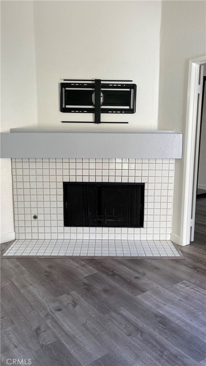 TV mount above fireplace