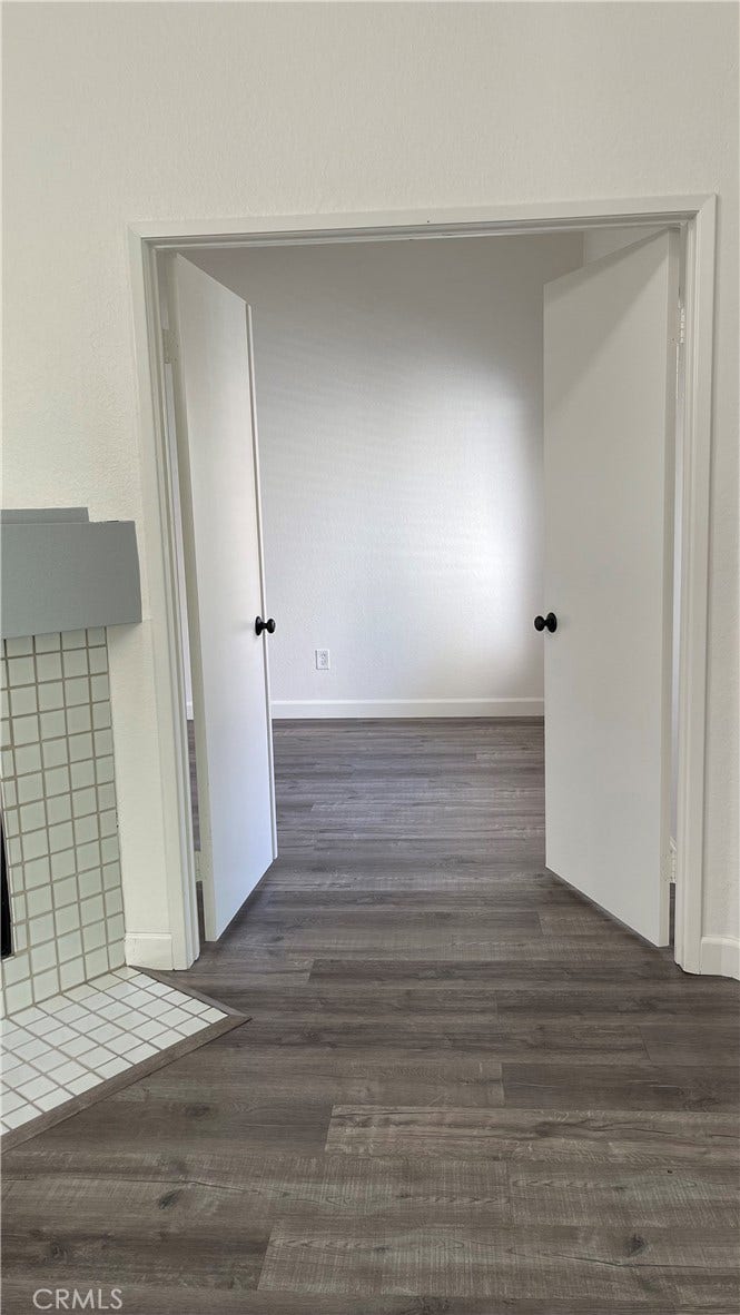 Double door entry to second bedroom/office/den