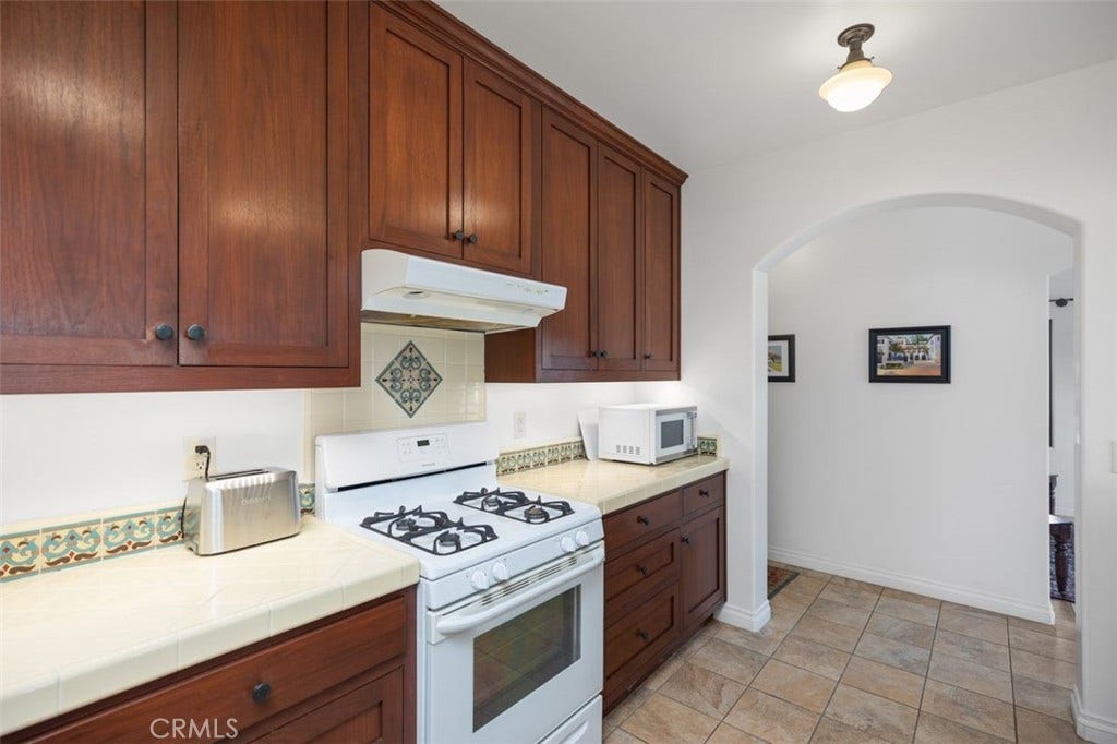 240 Avenida Rosa, #B, San Clemente, CA 92672 Kitchen looking towards hallway leading to bedroom and bathroom.