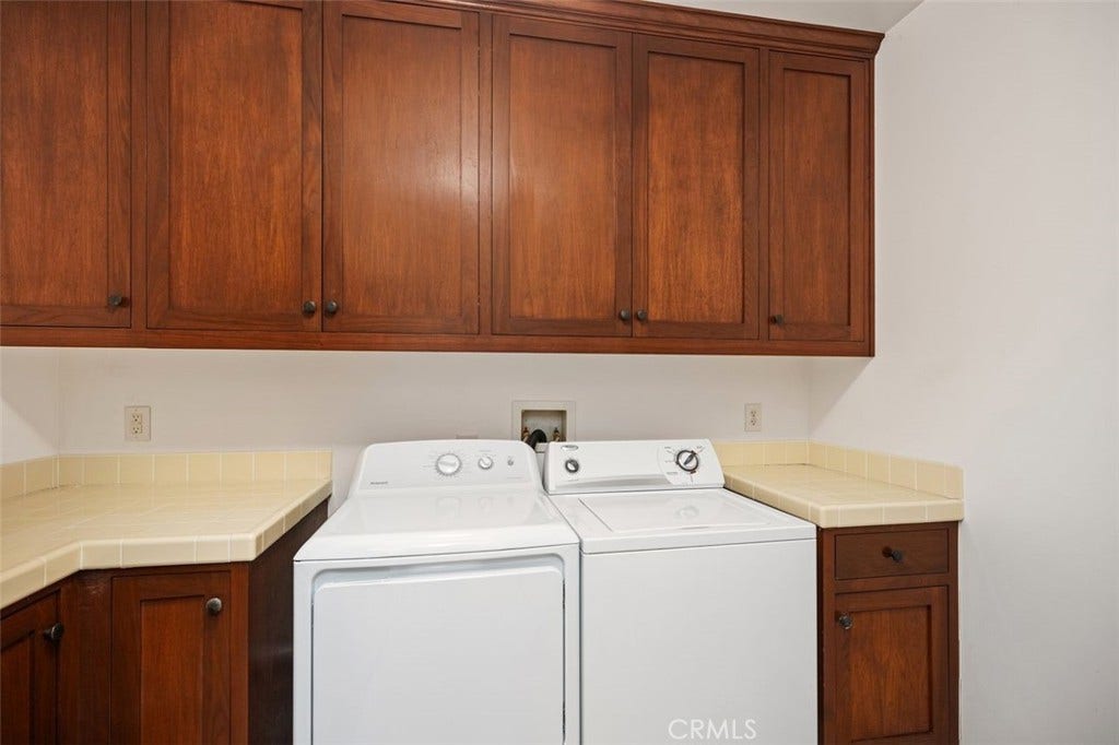 240 Avenida Rosa, #B, San Clemente, CA 92672 Laundry room with washer and dryer.