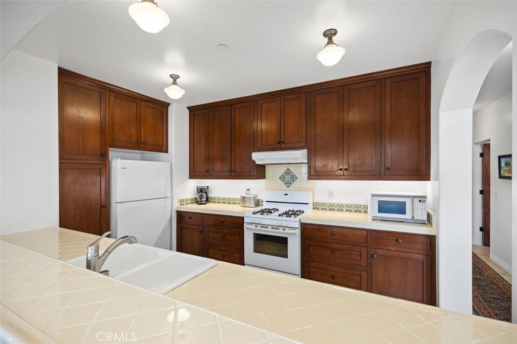 240 Avenida Rosa, #B, San Clemente, CA 92672 Kitchen with beautiful Spanish tiles.