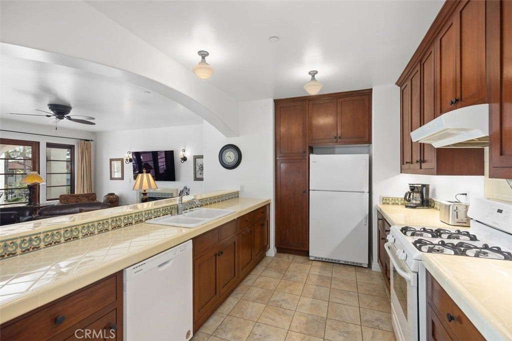 240 Avenida Rosa, #B, San Clemente, CA 92672 Kitchen with beautiful Spanish tiles.