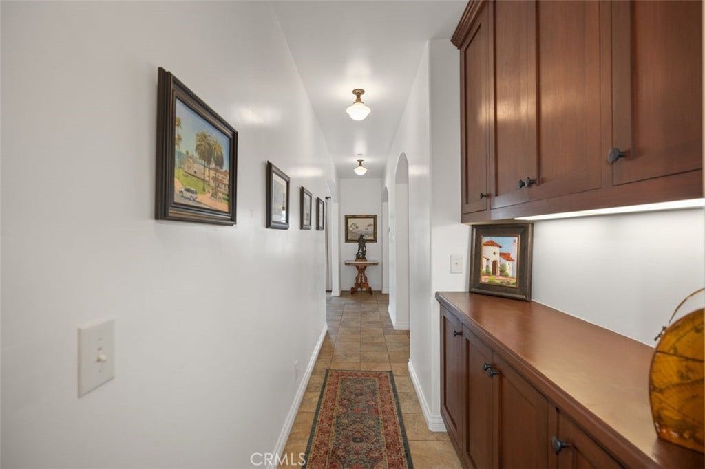 240 Avenida Rosa, #B, San Clemente, CA 92672 Hallway from bedroom and bathroom towards kitchen and living area.