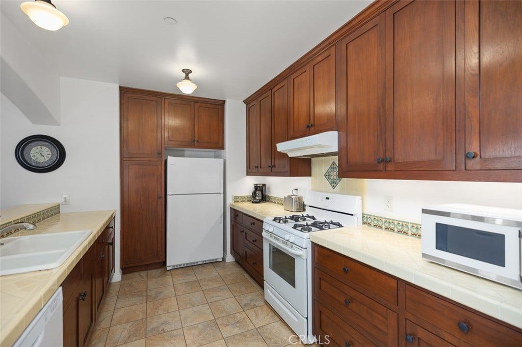240 Avenida Rosa, #B, San Clemente, CA 92672 Kitchen with beautiful Spanish tiles.