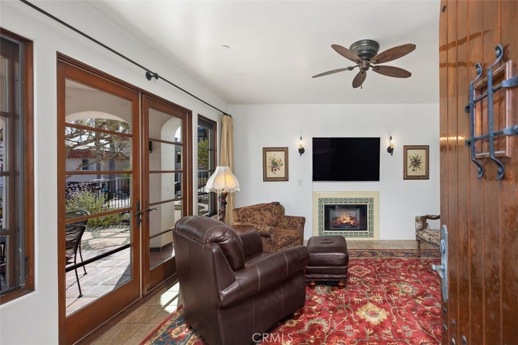 240 Avenida Rosa, #B, San Clemente, CA 92672 Living room with fireplace.