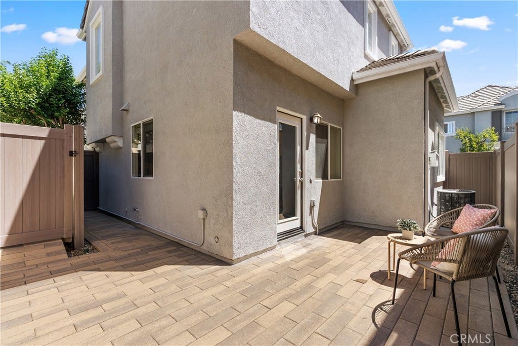 15 Poppyfield, Rancho Santa Margarita, CA 92688 Designed for easy living, the spacious paver patio offers multiple seating areas and a private setting for entertaining, relaxing, or enjoying Southern California's year round climate.