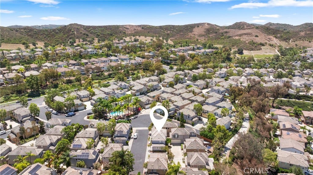 15 Poppyfield, Rancho Santa Margarita, CA 92688 Nestled against a backdrop of beautiful open space and rolling hills, the neighborhood offers a tranquil setting with convenient access to miles of scenic hiking and biking trails.