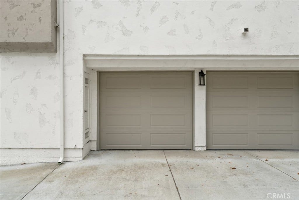 23638 Kingdon Court, #88, Laguna Niguel, CA 92677 Association completed new garage doors recently.