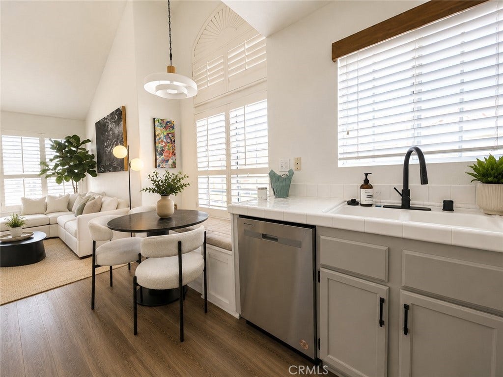 digitally staged - actual size of kitchenette table and window bench