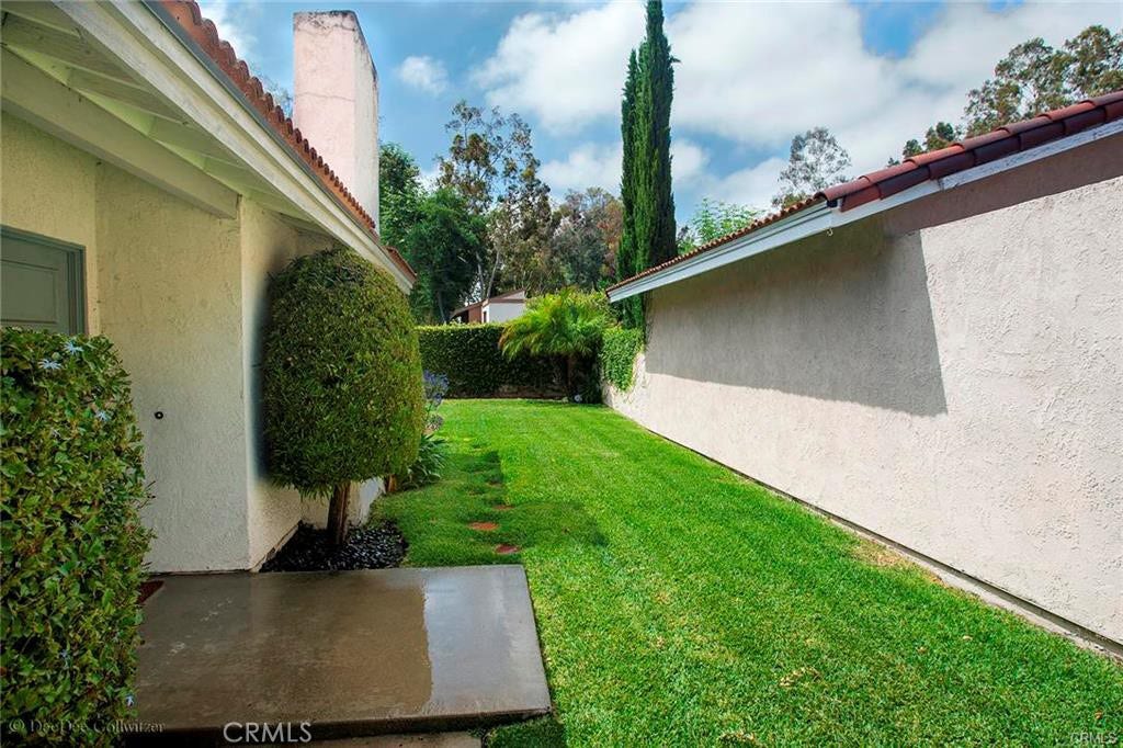 Front Door with side yard.