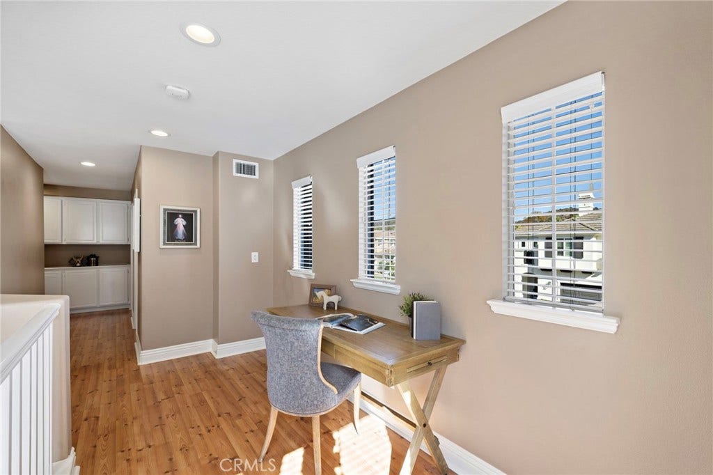 27 Las Cruces, Rancho Santa Margarita, CA 92688 In addition to all the rooms, this home offers a lovely loft which is ideal for a work or homework space. Many of these homes have added built-in desks.