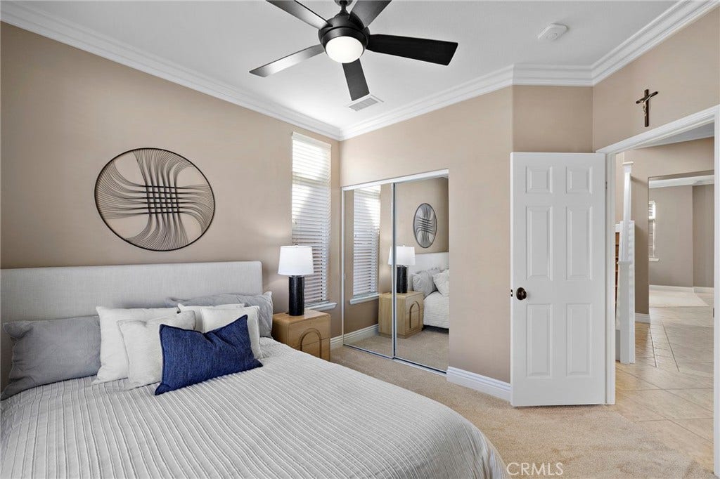 27 Las Cruces, Rancho Santa Margarita, CA 92688 Downstairs bedroom is complete with a mirrored wardrobe and ceiling fan.