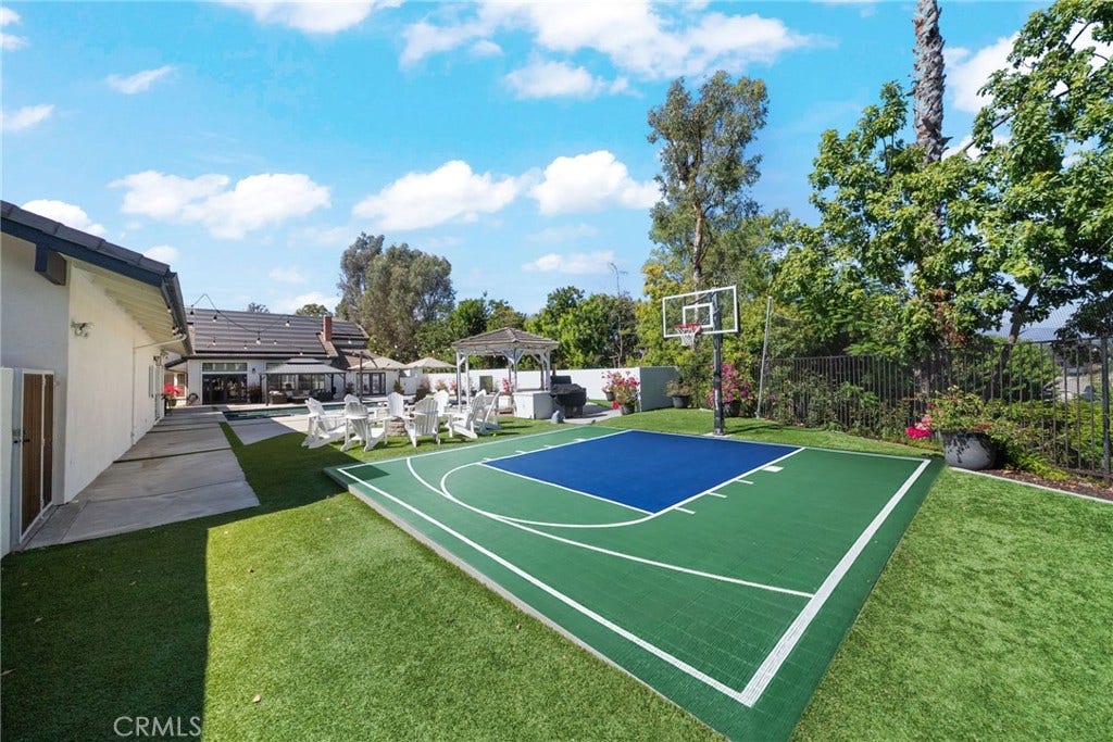 25902 Hitching Rail, Laguna Hills, CA 92653 Paint on sports court have been digitally added.
