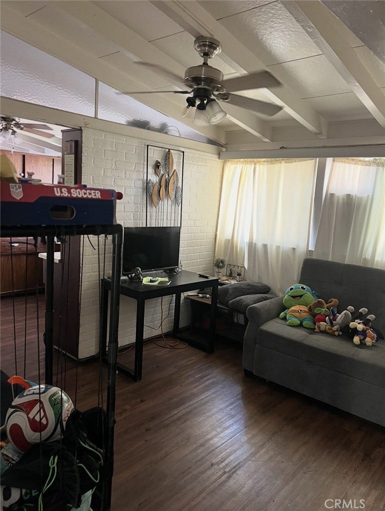 2123 W Romneya, Anaheim, CA 92801 Den: Potential 4th bedroom, door access to the hallway, window and a closet. Simply need to close off pass through to the kitchen