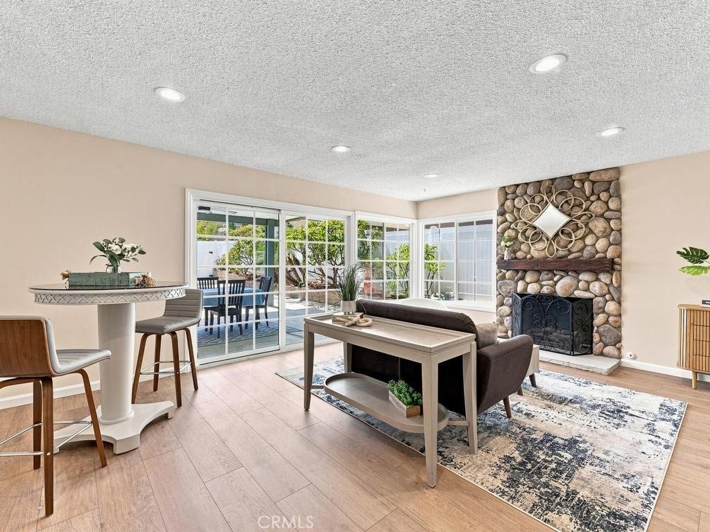 23862 Copenhagen, Mission Viejo, CA 92691 Separate family room with fireplace and slider access to covered patio