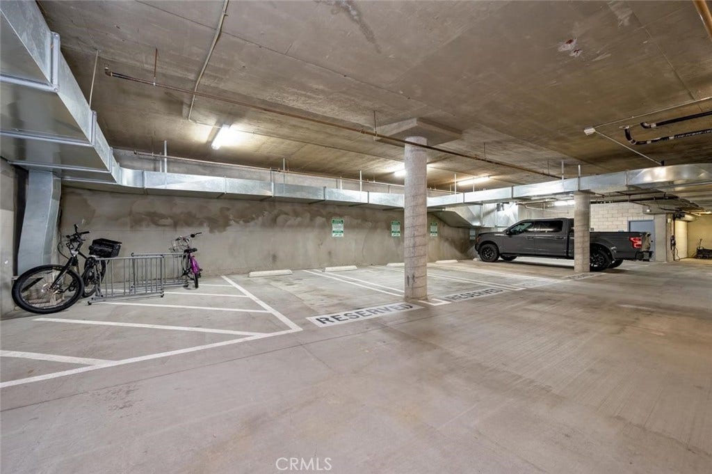 1520 N El Camino Real, #26, San Clemente, CA 92672 Other reserved parking space for unit 26 is adjacent to the bicycle rack.