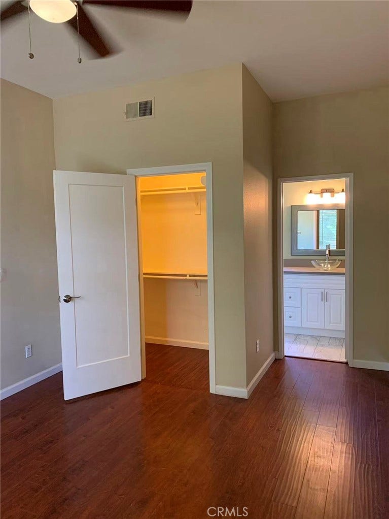Other suite, with walk-in closet.