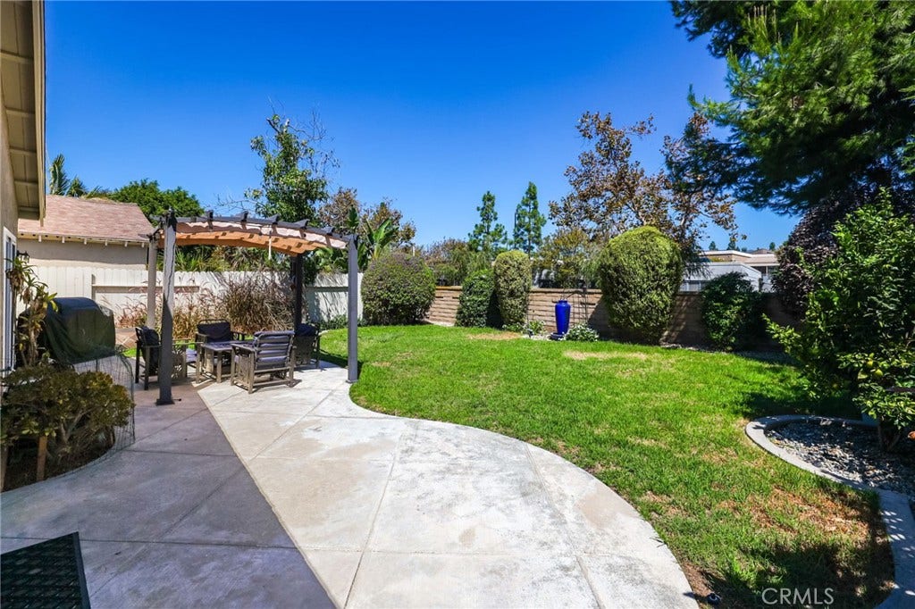 27531 Genil, Mission Viejo, CA 92691 Backyard with Urn water feature, curbed concrete & landscaping