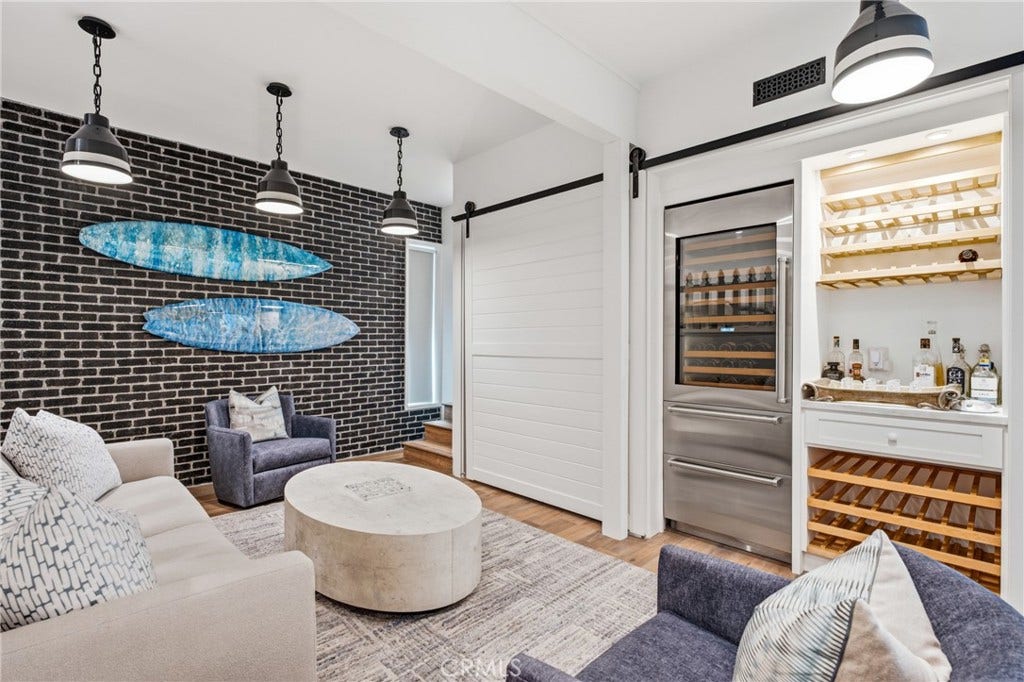Secondary bedroom 2 with a play/sleeping loft and a built in bar.