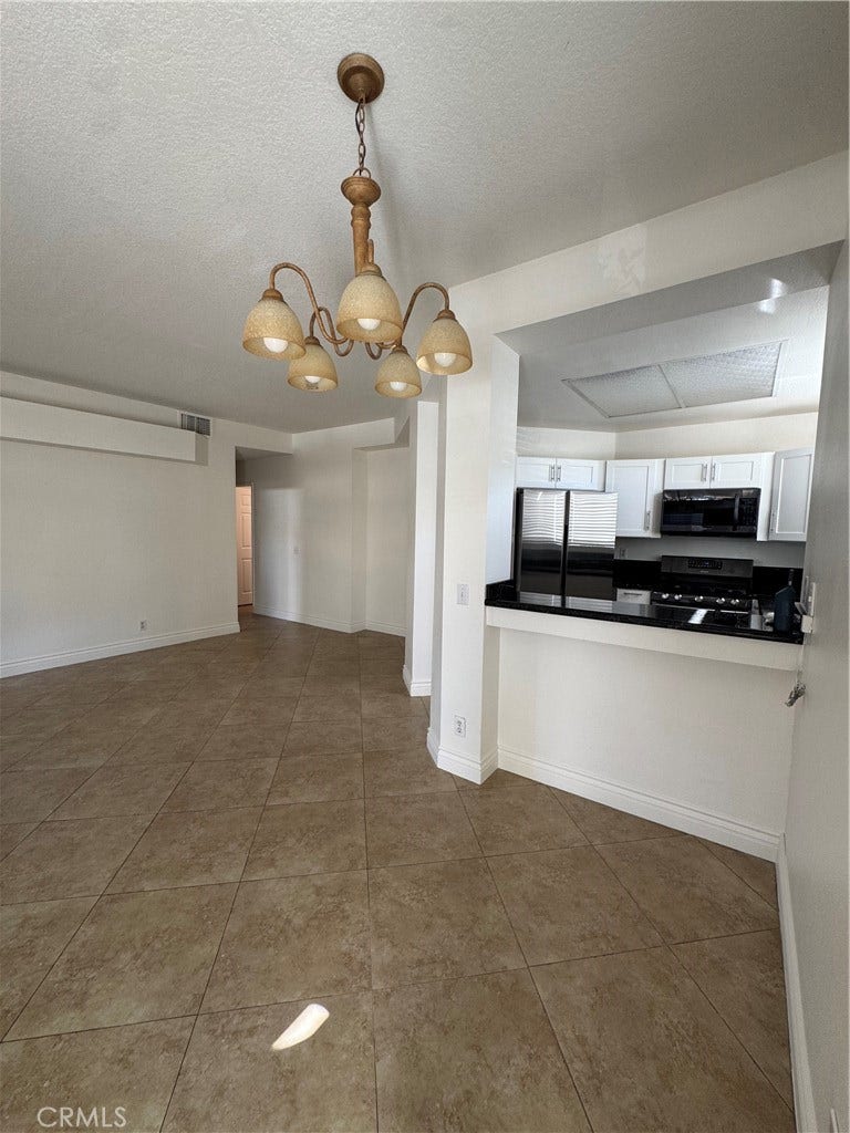 25071 Camino Del Mar, Laguna Niguel, CA 92677 Family room and kitchen
