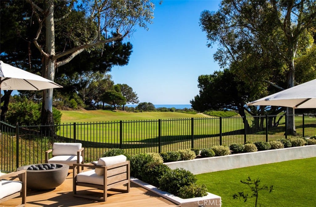 16 Pelican Point, Newport Coast, CA 92657 Golf course and ocean views define the homes exceptional setting within one of Newport Coasts most coveted guard-gated communities.