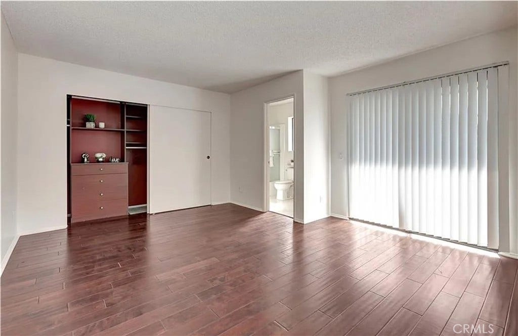 25245 Tanoak Ln., Lake Forest, CA 92630 One of 2 bedrooms with built in cabinet.